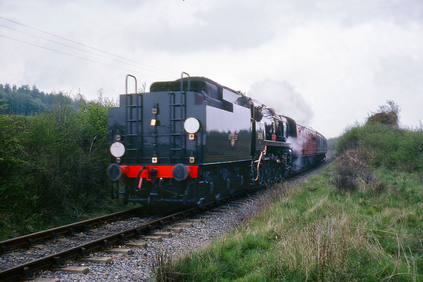 34016, 13.00 Ropley-New Alresford, Bishop's Sutton SU605326 
 Bulleid 4-6-2 34016 'Bodmin' works tender first leading the 13.00 Ropley to New Alresford service on the Watercress Line. The restoration and complete re-build of the former West Country locomotive had been completed the previous year in 1979 and it looked absolutely superb. Dating from 1945, the locomotive was withdrawn in mid-1964 being sent straight away to Barry. Rescue came in 1973 when it went, initially, to the Buckinghamshire Railway Centre at Quainton and then to Ropley where it underwent its extensive restoration. 
 Keywords: 34016 13.00 Ropley-New Alresford Bishop's Sutton SU605326 Mid Hants Railway Watercress Line Bodmin