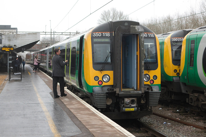 350118, LM 08.24 London Euston-Birmingham New Street (2Y97), Northampton station 
 My son and I took 350118 from Northampton to New Street working the 08.24 from London Euston. Out of sight behind me 350262 is coming in from the Kingsheath EMUD to join this unit to run as an eight car formation to Birmingham. 
 Keywords: 350118 08.24 London Euston-Birmingham New Street 2Y97 Northampton station