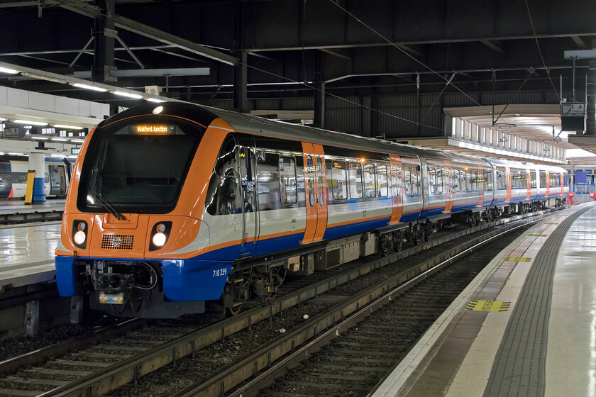 710259, LO 14.30 London Euston-Watford Junction (2D85, RT), London Euston station 
 On arrival at Euston, the brightly liveried 710259 is seen standing at platform nine. It will soon work the London Overground 14.30 service to Watford Junction. 
 Keywords: 710259 14.30 London Euston-Watford Junction 2D85 London Euston station LO London Overground