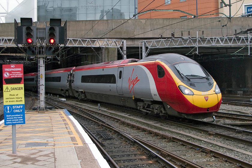 390130, VT 15.43 London Euston-Edinburgh (9S80), Birmingham New Street station 
 390130 'City of Edinburgh' arrives at Birmingham New Street with the 15.43 Euston to Edinburgh. Going via Birmingham with several intermediate stops, rather than the Trent Valley route means that this service takes a fair bit longer to reach Scotland. 
 Keywords: 390130 15.43 London Euston-Edinburgh 9S80 Birmingham New Street station