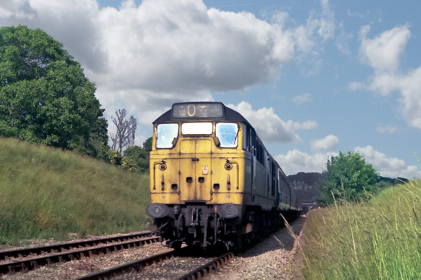 31309, unidentified Portsmouth Harbour-Bristol Temple Meads working, Bradford-on-Avon foot crossing ST820605 
 31309 was a regular performer in this area. Here, it is seen in the sunshine (at last!) passing the second of Bradford-on-Avon's foot crossings with a Portsmouth Harbour to Bristol Temple Meads working. Not only have I chosen one of my trademark low angle shots but I am also on the wrong side for the sun! Looking at the position of the shadows I suspect that it was now late afternoon or early evening.