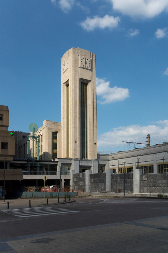 Frontage, Brussels Nord station 
 The impressive clock tower rises above the frontage of Brussels Nord station. This station was opened in 1952 at the same time that the grand project to link the two sides of the city by rail was constructed. This scheme, referred to as the 'NorthSouth Connection' involved a massive tunnelling scheme that went right under the city centre. 
 Keywords: Frontage Brussels Nord station