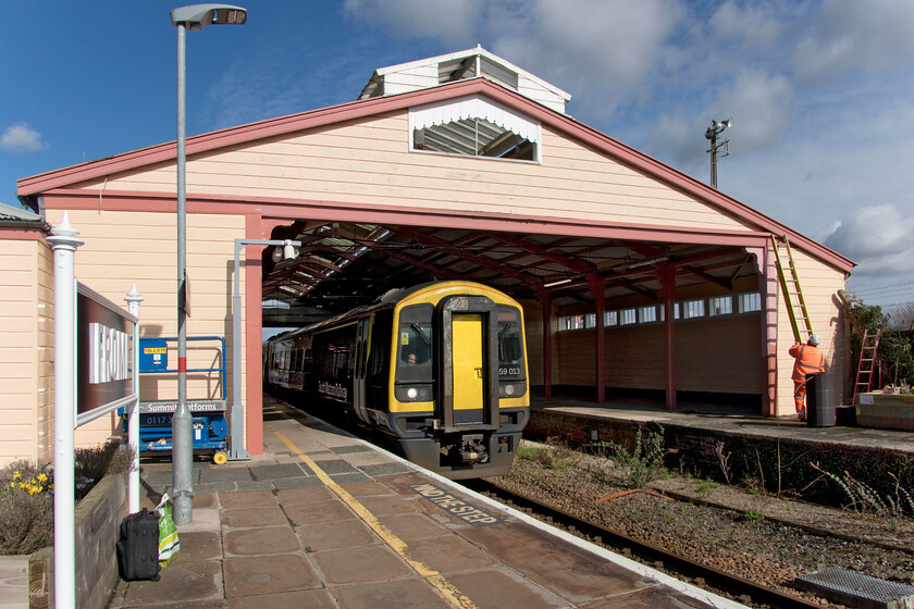 159013, SW 10.38 Basingstoke-Yeovil Junction (1V23, 1E), Frome station 
 159013 waits at Frome station under some bright early spring sky working the 10.38 Basingstoke to Yeovil Junction SWR service. After looking a little rough around the edges for a few years the Grade II listed station, dating from 1860 making it one of the oldest train sheds in the country, is undergoing some sympathetic painting using appropriate heritage colours. It's a shame that the station has only one track passing through its building making it look a little unbalanced but economics have dictated this for many years now. 
 Keywords: 159013 10.38 Basingstoke-Yeovil Junction 1V23 Frome station SWR South Western Railway