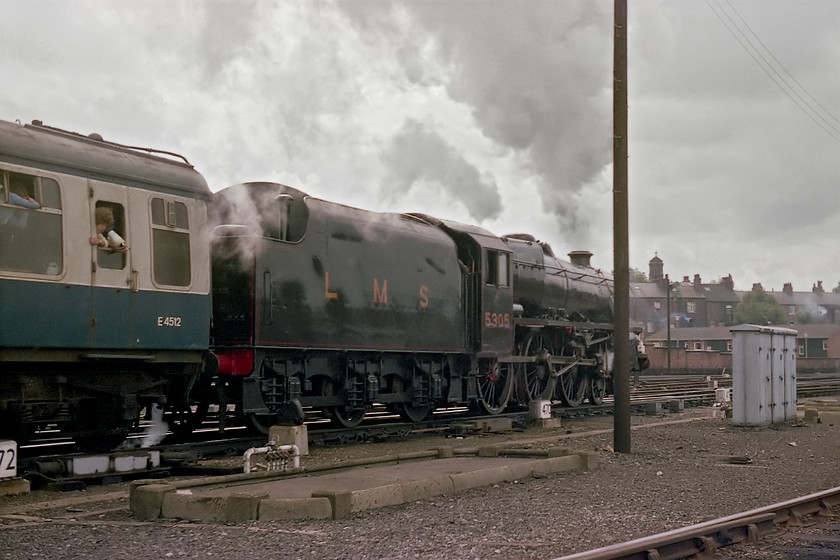 5305, outward leg of The York Circular, 13.45 York-Leeds-Harrogate-York, York station 
 Yes, I am trespassing but so were hundreds of others next to me! They were all watching the spectacle of Class 5 4-6-0 5305 leaving York station in some style with The York Circular. The BR Eastern Region organised specials ran over the summer of 1978 running from York to Leeds, then to Harrogate and back to York. They proved to be very successful with every one hauled by 5305. 
 Keywords: 5305 The York Circular 13.45 York-Leeds-Harrogate-York York station