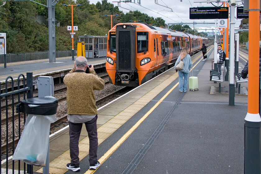 196005, LN 14.40 Hereford-Birmingham New Street (1M89, 10L), Bromsgrove station 
 Andy captures his image of 196005 as it comes to a halt at Bromsgrove station. As can be seen from the passenger information screen, the West Midlands Trains service will terminate at Birmingham New Street having left Hereford at 14.40. I still struggle to get used to seeing these sets with no yellow front ends with their new generation LED light packs considered sufficient for siting purposes. 
 Keywords: 196005 14.40 Hereford-Birmingham New Street 1M89 Bromsgrove station West Midlands Trains