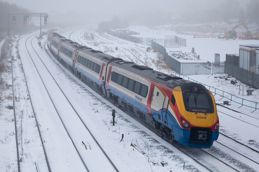 222018, EM 08.16 Corby-London St. Pancras (1P19, 10L), Wellingborough Finedon Road bridge 
 East Midlands Meridian 222018 slows for its stop at Wellingborough station forming the 08.16 Corby to London St. Pancras. This is a going-away shot taken off Wellingborough's Finedon Road bridge. Very soon after this picture was taken the road and bridge was closed for rebuilding, I bet a shot like this will be impossible when it reopens due to the hideously high parapet that Network Rail insist on fitting to their new bridges! 
 Keywords: 222018 1P19 Wellingborough Finedon Road bridge