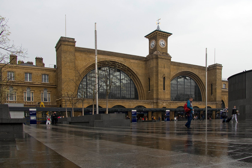 Frontage, King`s Cross station 
 I have taken a number of pictures of King's Cross' frontage over time. It was designed by Lewis Cubitt for the Great Northern Railway and was opened in 1852. Cubitt came from a family of architects who all made their mark on London's skyline during Victorian times. The main feature of the frontage is the superb central clock tower that contained a treble, a tenor and a bass bell, the latter weighing 1 ton 9 cwt (1.47 tonnes). Recent work by Network Rail has really opened up the frontage again after various schemes under BR hid it from view. 
 Keywords: Frontage, King`s Cross station