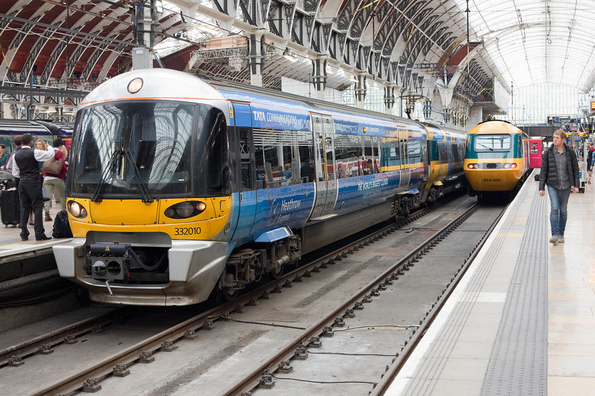 332010, HX 15.55 London Paddington-Heathrow T5 (1T67) & 43002 (253001), GW 16.00 London Paddington-Bristol Temple Meads (1C21), London Paddington station 
 I turned my camera for one final picture of 43002 'Sir Kenneth Grange' in its retro. BR livery as worn from its introduction in 1976. It is about to work the 16.00 to Bristol temple Meads. Next to it, Heathrow Express' 332010 is preparing to leave with the 15.55 to Heathrow Terminal 5. 
 Keywords: 332010 15.55 London Paddington-Heathrow T5 1T67 43002 253001 16.00 London Paddington-Bristol Temple Meads 1C21 London Paddington station