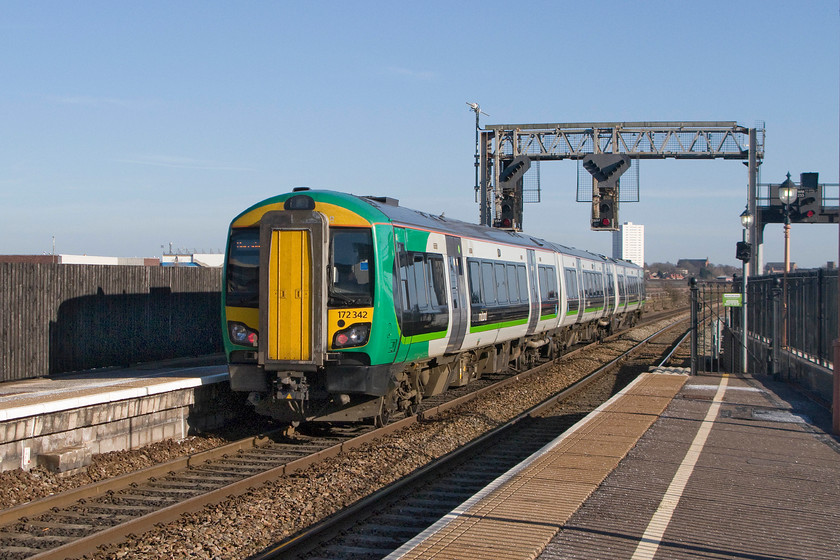 172342, LM 14.12 Worcester Shrub Hill-Dorridge (2C48), Birmingham Moor Street station 
 In superb late afternoon sunshine, 172342 leaves Birmingham Moor Street with the 14.12 Worcester Shrub Hill to Dorridge working. London Midland has fifteen class 172/3 units for use exclusively on the cross-Birmingham Snow Hill routes. Along with a smaller number of 172/2s, they have gangway connections unlike the 172/1s and a further few 172/2s operated by Chiltern. 
 Keywords: 172342 14.12 Worcester Shrub Hill-Dorridge 2C48 Birmingham Moor Street station