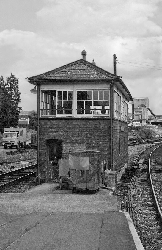 Yeovil Pen Mill signal box (GW, 1937) 
 The superb Yeovil Pen Mill signal box stands on the platform end. At the time of writing in 2022 it is still in use and very much as seen here but with the addition of a rather unattractive personal needs cabin. The last time that I visited this bastion of lower quadrant mechanical signalling was back in 2017, see.... https://www.ontheupfast.com/p/21936chg/24819767004/x159104-sw-16-46-yeovil-junction 
 Keywords: Yeovil Pen Mill signal box GW 1937)