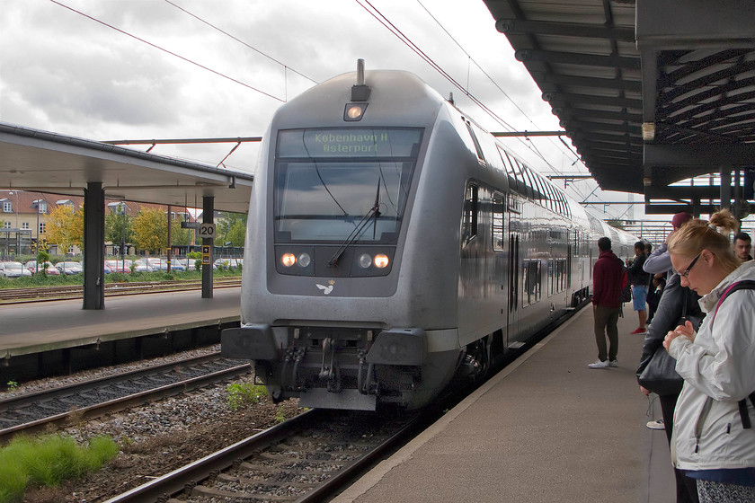 DVT, 13.58 Kalundborg-sterport, Roskilde station 
 Our train back from Roskilde arrives at the busy station lead by a DVT or a steering wagon as they are referred to on Danish railways. We took the 13.58 Kalundborg to sterport back to Copenhagen enjoying the space and comfort of the Bombardier built double-decker coaches. 
 Keywords: DVT 13.58 Kalundborg-sterport Roskilde station