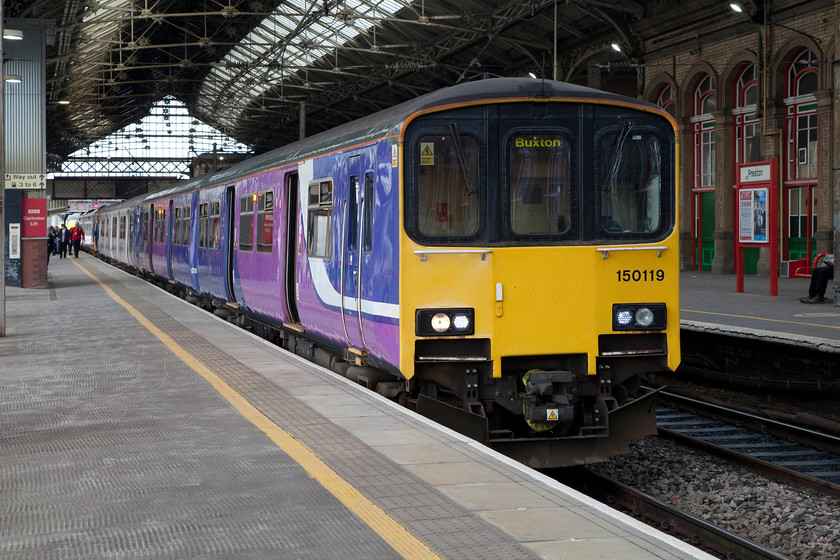 150119, NT 16.23 Preston-Buxton (2B92, 9L), Preston station 
 Northern 150119 waits to depart from Preston station working the 16.23 to Buxton. This is an interesting journey starting on the plains of Lancashire, through the heart of the UK's twelfth largest city and then winding up high into the Peak District. 
 Keywords: 150119 2B92 Preston station