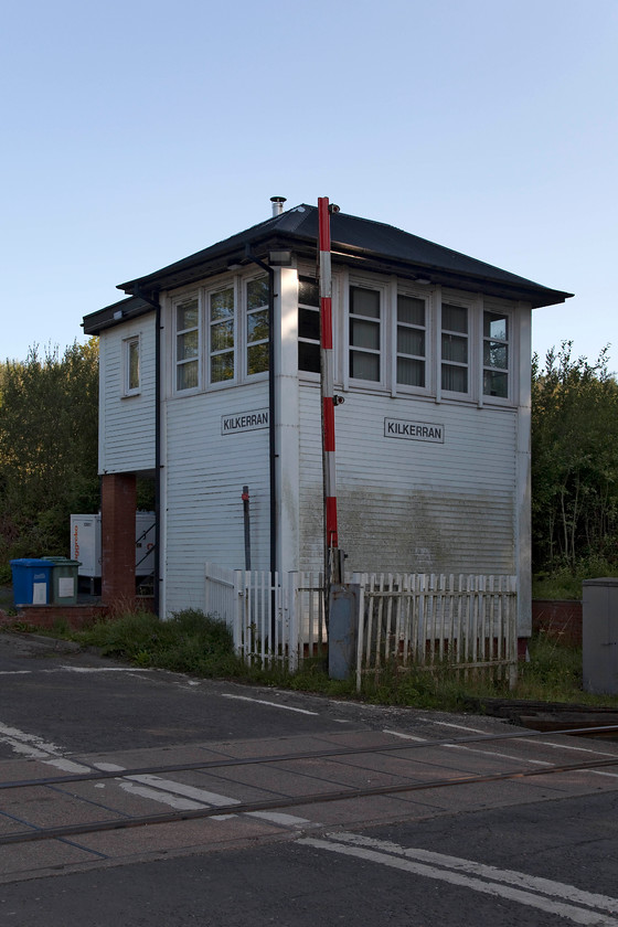 Kilkerran signal box (GSW, 1895) 
 This signal box took a little finding! Apart from its remote location in the rolling hills north of Girvan it takes its name from the grand Kilkerran House some three miles away. This is despite that the actual signal box and, until it closed in 1965, station is actually situated in the village of Ruglen. Naming a station or a crossing after the local landed gentry's residence was common practice in Victorian times and usually acted as a sweetener to the them who's land the railway was going to pass through. The signal box is a Glasgow and South Western structure erected in 1895 to replace two previous boxes at the same location. 
 Keywords: Kilkerran signal box