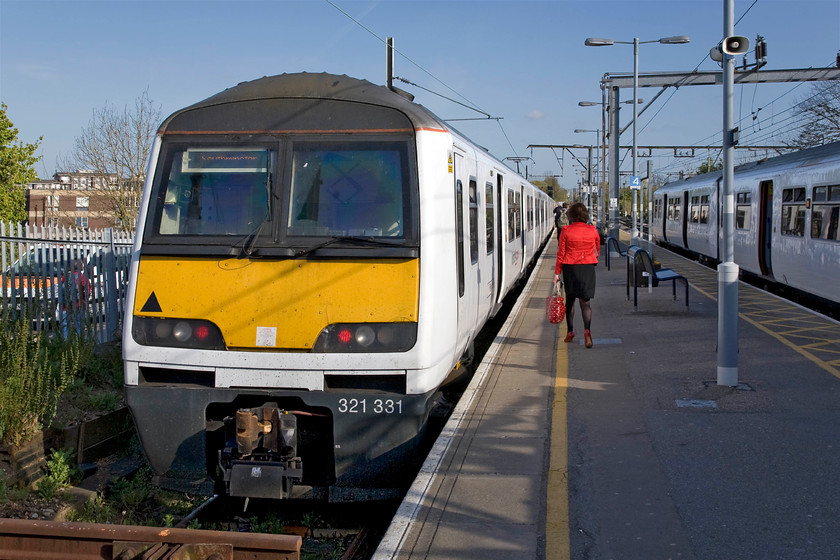 321331, LE 17.06 Wickford-Southminster (2J42) & Class 321, LE (1K68) 16.24 Liverpool Street-Southend Victoria (1K68), Wickford station 
 This is my third photograph of Greater Anglia's 321331 working, along with another unit, the Southminster branch on this particular day. Currently sta in Wickford's bay platform it will leave in the next few minutes with the 17.06 service to Southminster. On the adjacent platform in this view and unidentified unit forms the 1K68 16.24 Liverpool Street to Southend Victoria. 
 Keywords: 321331 17.06 Wickford-Southminster 2J42 Class 321 1K68 16.24 Liverpool Street-Southend Victoria 1K68 Wickford station Abellio Greater Anglia