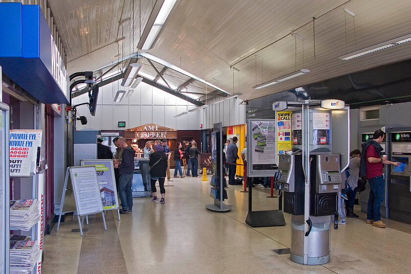 Foyer, Northampton station 
 The foyer of Northampton station is surprisingly quiet on this Saturday morning. It has become completely inadequate with the growth in rail travel with this scene on a busy weekday morning being totally different packed with commuters heading for London. 
 Keywords: Foyer Northampton station