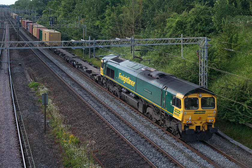 66533, 02.57 Felixstowe North-Garston FLT (4M45) on the down fast, Victoria Bridge 
 Due to the closure of the loop line between Northampton and Rugby because of an 'incident' signallers at control had to make some rapid decisions. As freights were already pouring into the area from all directions, they had to keep them moving with nowhere suitable to loop them all. So, in an unusual step, they pathed the various freights in between normal service trains on the up and down fast Weedon lines. 66533 'Senator Express' hauling the 02.57 Felixstowe to North Garston Freightliner was one of the freights that was permitted to take the down fast at its maximum speed of 70mph. This meant that various Pendolinos, with a permitted line speed of 110mph, were stacked up behind it running on cautions all the way to Rugby. Most carried these consequential delays all the way to their destinations. 
 Keywords: 66533 02.57 Felixstowe North-Garston FLT 4M45 Victoria Bridge