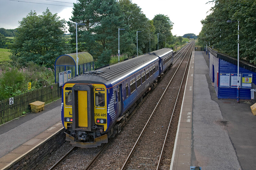 156495, NT SR 17.16 Newcastle-Glasgow Central (1S73), Brampton station 
 With the light now dropping a little at Brampton station 156495 waits to leave working the 17.16 Newcastle to Glasgow Central service. This 1S73 is a little unusual in that it is a joint operation between ScotRail and Northern, given its routing, this makes some sense. The station is a shadow of its former self having lost virtually all of its buildings and structures. It once boasted a horse-drawn (later converted to conventional haulage) branch line, known locally as The Dandy, to the town of Brampton itself some two miles to the northwest. However, this closed in 1923 and today its route can be enjoyed by walkers and cyclists alike 
 Keywords: 156495 17.16 Newcastle-Glasgow Central 1S73 Brampton station