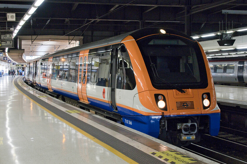 710266, LO 14.15 London Euston-Watford Junction (2D84, RT), London Euston station 
 Aventra 710266 is seen just prior to departure at Euston's platform nine working the 14.15 service to Watford Junction. These units look to me more reminiscent of some sort of continental metro train rather than a heavyweight service train not helped by their lack of a hi-viz yellow front end. Introduced in May 2019 (after the inevitable and customary delays) the fifty-four Class 710s have proved a successful design being, effectively, an overground underground train! 
 Keywords: 710266 14.15 London Euston-Watford Junction 2D84 London Euston Aventra