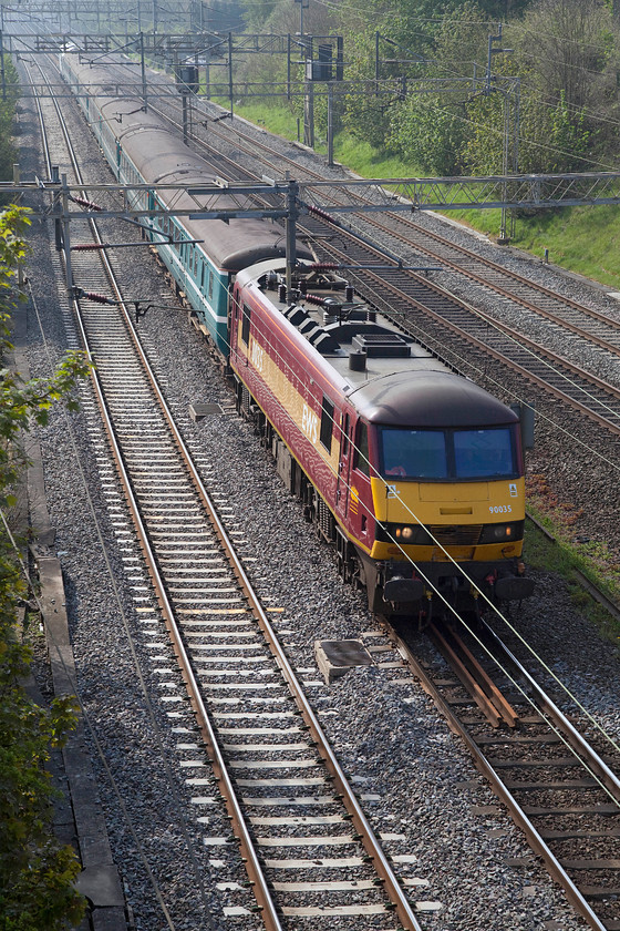 90035, 09.01 London Euston-Atherstone (1Z95), Victoria bridge 
 I never did find out why this excursion was going as far as Atherstone? 90035 leads the ex. Anglia Mk. II stock past Victoria bridge as the 09.01 1Z95 ex. Euston. Can anybody advise me as the purpose of the working that had 67029 'Royal Diamond' on the rear? 
 Keywords: 90035 09.01 London Euston-Atherstone 1Z95 Victoria bridge