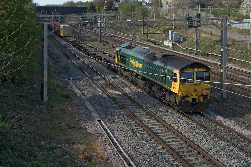 66531, 12.57 Birch Coppice-Felixstowe North (4L57, 3E), site of Roade station 
 Due to the closure of the down and up slow lines at Roade because of the investigation following the tragedy of a track-worker being hit by a train, all freight was moved to the fast lines once they re-opened at about 14.00. 66531 leads the 4L57 12.57 Birch Coppice to Felixstowe Freightliner past the site of Roade station on my website's namesake, 'the up fast'! 
 Keywords: 66531 12.57 Birch Coppice-Felixstowe North 4L57 site of Roade station Freightliner