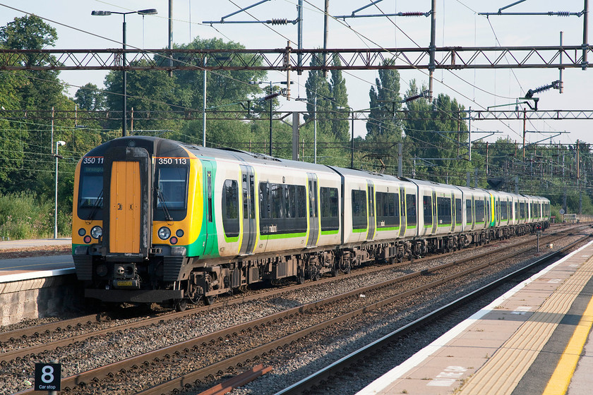 350251 & 350113, LM 07.37 Northampton-Birmingham New Street (2Y05), Northampton station 
 A beautiful start to the day at Northampton station. 350251 and 350113 leave the station with the 2Y05 07.37 to Birmingham New Street. 
 Keywords: 350251 350113 07.37 Northampton-Birmingham New Street 2Y05 Northampton station