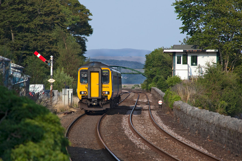 156429, NT 14.41 Carlisle-Lancaster (2C58), Grange-over-Sands 
 156429 leaves Grange-over-Sands forming the 14.41 Carlisle to Lancaster 2C58 working. The train is passing Grange's up starter signal and BR box of 1956 vintage. It's been many years since I have visited Grange-over-Sands but I am feeling the 'need' to go back again soon before the Victorian signalling is wiped away. 
 Keywords: 156429 2C58 Grange-over-Sands