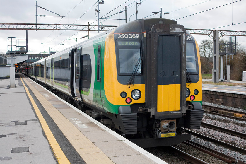 350369, LM 08.33 Birmingham New Street-London Euston (1W06, 36L), Northampton station 
 350369 is the rear set of our eight coach train to Euston from Northampton. Due to services being re-timetabled because of the arrival of Storm Dorris the train ran a reduced speed and arrived into London some 36 minutes late. 
 Keywords: 350369 1W06 Northampton station