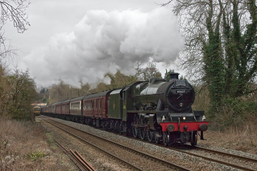 45699 (running as 45627), outward leg of 'The Bath & Gloucester Steam Express', 07.13 London Paddington-Gloucester (1Z32, 1E), Bradford-on-Avon no. 1 crossing ST822605 
 With an impressive display of exhaust, the driver is really opening up the regulator of 45699 'Galatea' as it begins its journey along the delightful and winding Avon Valley between Bradford-on-Avon and Bath. Eagle-eyed readers will notice that the former LMS Jubilee is wearing the number 45627 and that it was carrying the nameplate 'Sierra Leone'. The charter was running as 1Z32 and named The Bath and Gloucester Steam Express. that had left London Paddington at 07.13 arriving at its destination on time. I was disappointed with the dull weather but only realised afterwards that if the sun had been out this photograph would have been severely compromised as it would have been taken looking into it! 
 Keywords: 45699 Galetea 45627 Sierra leone outward leg of 'The Bath & Gloucester Steam Express', 07.13 London Paddington-Gloucester 1Z32 Bradford-on-Avon no. 1 crossing ST822605