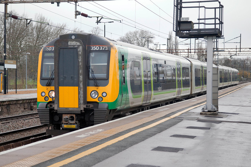 350373, LM 11.33 Birmingham New Street-London Euston (1W12, 13L), Northampton station 
 This is the train that my sone and I took to London from Northampton. The 11.33 ex. Birmingham worked by 350373 arrives into platform one at Northampton station. 
 Keywords: 350373 11.33 Birmingham New Street-London Euston 1W12 Northampton station