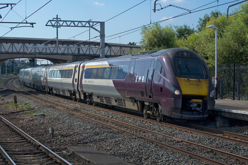 222102, EM 09.35 London St. Pancras-Nottingham (1D23, 5L), Bedford station 
 222102 (formally named Professor Stuart Palmer when in operation with Hull Trains) speeds northwards through Bedford station with the 09.35 EMR service to Nottingham. With the introduction of the Class 810 Aurora bi-mode units the Meridians are due to be returned to Eversholt Rail Group by the end of this year (2022). However, with the first of the new units just coming off the production line and taking power to test their operating systems as this is being written in mid-August the ambition to have them in squadron operation in just four months may be a little optimistic? 
 Keywords: 222102 09.35 London St. Pancras-Nottingham 1D23 Bedford station EMR East Midlands Railway