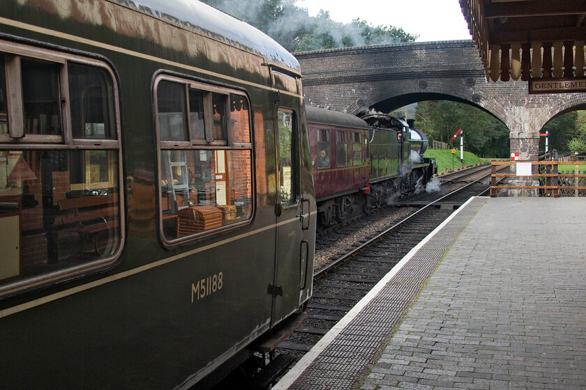 M51188, 10.20 Sheringham-Holt & 53809, 10.15 Sheringham-Holt, Weybourne station-15.10.23 
 As former S & D 7F 53809 gets the 10.15 Sheringham to Holt service away from Weybourne the rear end of the 10.20 Holt to Sheringham DMU service waits to depart. Class 101 motor coach M51188 is at the rear of the Sheringham service with the superbly restored Class 104 M56182 leading. 
 Keywords: M51188 10.15 Sheringham-Holt 53809 10.15 Sheringham-Holt Weybourne station-15.10.23 Class 101 DMU