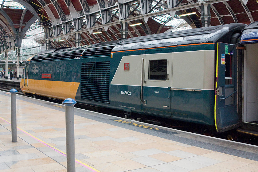 43002, GW 16.00 London Paddington-Bristol Temple Meads (1C21), London Paddington station 
 I had decided to leave Paddington and head for King's Cross. I happened to have to change tube trains at Edgware Road station that has 4G coverage. Whilst waiting on the platform I had a quick look at Rail Gen emails and there was a posting to say that celebrity HST 43002 was just arriving at Paddington. So, I hopped back on a District Line tube to Paddington again. I am still not sure how my Oyster Card coped with that particular move? Freshly repainted in BR blue and looking fabulous, 43002 'Sir Kenneth Grange' sits at the stops ready to return west with the 16.00 to Bristol temple Meads. 
 Keywords: 43002 16.00 London Paddington-Bristol Temple Meads 1C21 London Paddington station