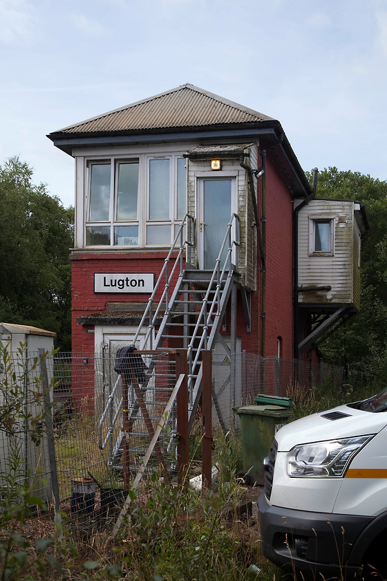 Lugton signal box (LMS, 1929) 
 Lugton signal box was constructed by the LMS in 1929. It has been extensively modified such as the inevitable UPVC windows. Lugton was once at the site of of a complex junction of a number of lines and a station just beyond the signal box as seen in this picture. It is now an intermediate block post that controls the one remaining junction with the mothballed spur to the MOD ordnance establishment at Giffen. This line has been out of use for many years but studying Google Earth finds that the track is still in situ but extremely overgrown. 
 Keywords: Lugton signal box