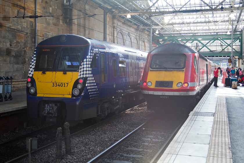 334017, SR 16.48 Edinburgh Waverley-Helensburgh Central (2H59) & 43251, GR 12.00 London King`s Cross-Inverness (1S16), Edinburgh Waverley station 
 To the left, 334017 is about to leave Edinburgh Waverley with the 16.48 to Helensburgh Central. Meanwhile, there appears to be a lot of passengers on platform eleven for the 12.00 King's Cross to Inverness. The rear power car, 43251, is just coming up for 40 years old being built at Crewe Works in 1977 for the Western Region originally being part of 253025. 
 Keywords: 334017 16.48 Edinburgh Waverley-Helensburgh Central 2H59 43251 12.00 London King`s Cross-Inverness 1S16 Edinburgh Waverley station