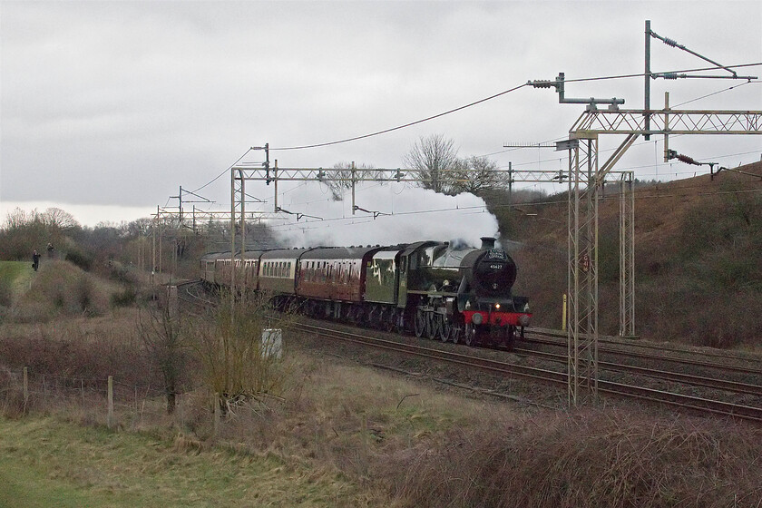 45699 (45627), outward leg of 'The Cheshireman', 06.50 London Euston-Chester (1Z33, 1L), Old Linslade 
 I saw this same steam locomotive a few weeks back down in the West Country, see.... https://www.ontheupfast.com/p/21936chg/30036747383/x45699-galatea-45627-sierra-leone but seeing it on what would have been more of its traditionally associated natural home got me out early on this miserable and grey March morning. 45699 'Galatea' masquerading as 45627 'Sierra Leone' races along the down slow line at Old Linslade just north of Leighton Buzzard. It was leading the 1Z33 'Cheshireman' charter from Euston to Chester where it arrived just one minute late. Notice that there are a number of other enthusiasts out who are equally as silly as me to witness the event. 
 Keywords: 45699 Galatea 45627 Sierra Leone outward leg of 'The Cheshireman', 06.50 London Euston-Chester 1Z33 Old Linslade