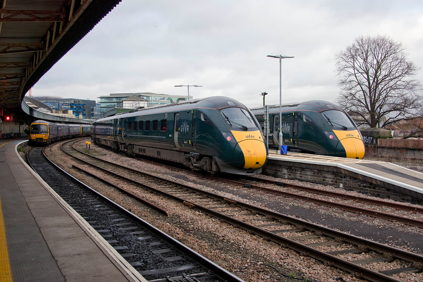 166221, GW 12.13 Swindon-Bristol Temple Meads (1Z43, RT), 800317,-GW 14.00 Bristol Temple Meads-London-Paddington (1A20, 4E) & 800311, GW 14.30 Bristol Temple Meads-London Paddington (1A20, RT), Bristol Temple Meads station 
 This is the first time that I have visited Bristol temple Meads since the introduction of the IETs replacing the HSTs and it seemed very strange! To see 800317 and 800311 sitting at the former parcel platforms working the 14.00 and 14.30 workings to Paddington takes a little getting used to. They mark yet another incarnation of motive power working the Bristol to London express trains that I have experienced in my spotting career at Temple Meads, starting off with the Westerns, then to the 50s with the HSTs replacing them from 1976 onwards. Note 166221 and another unit to the left having arrived a little earlier with the rather odd 12.13 from Swindon running as 1Z43, any ideas or local knowledge on this working please? 
 Keywords: 166221 12.13 Swindon-Bristol Temple Meads 1Z43 800317 14.00 Bristol Temple Meads-London-Paddington 1A20 800311 14.30 Bristol Temple Meads-London Paddington 1A20 Bristol Temple Meads station IET Great Western Railway