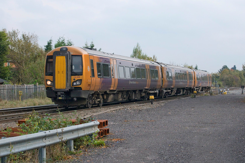 172332, LN 13.03 Stratford-on-Avon-Stourbridge Junction (2W78, RT), Bentley Heath level crossing 
 172332 approaches Bentley Heath level crossing just to the north of Dorridge with the 13.03 Stratford-on-Avon to Stourbridge Junction service. The gravelled area in the foreground used to be where the other two tracks ran following the GWR quadrupling their route south of Birmingham in the early 1930s only for British Railways to remove them in the 1960s as they down graded the route for possible closure. 
 Keywords: 172332 13.03 Stratford-on-Avon-Stourbridge Junction 2W78 Bentley Heath level crossing