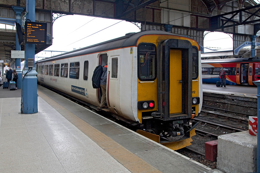 156412, LE 15.36 Norwich-Great Yarmouth (2P26) & 158866, EM 09.52 Liverpool Lime Street-Norwich (1L08), Norwich station 
 At Norwich, a passenger boards 156412 that will work the 15.36 to Great Yarmouth in about ten minutes time. Notice the branding on the side of the DMU encouraging one to 'Ride the Gainsborough Line' indicating that this unit will often work on the Marks Tey to Sudbury branch. Andy and I have vowed that this (and its neighbour, the shorter branch to Braintree) will be subject to a visit sooner than later. In the background, 158866 can be seen in its brighter East Midlands livery having arrived with the 09.52 from Liverpool Lime Street. 
 Keywords: 156412 15.36 Norwich-Great Yarmouth 2P26 158866 09.52 Liverpool Lime Street-Norwich 1L08 Norwich station