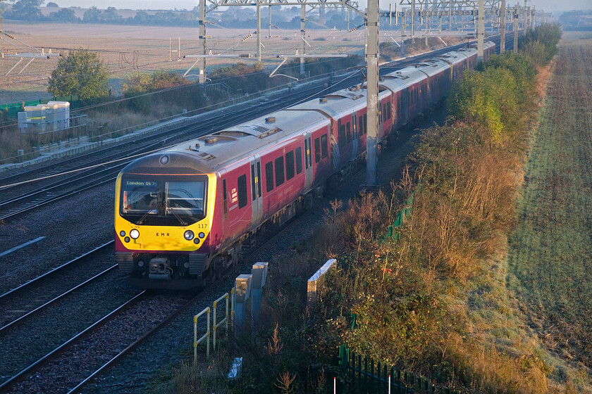 360117 & 360107, EM 07.39 Corby-London St. Pancras (1H10, 1L), Harrowden Junction 
 360117 and 360107 pass Harrowden Junction between Kettering and Wellingborough working EMR's 07.39 Corby to St. Pancras service. EMR has recently announced that these reliable hand-me-down units are going to be treated to a complete overhaul in internal re-fit that will probably be their last before withdrawal comes with the first ones entering service way back in 2002. 
 Keywords: 360117 360107 07.39 Corby-London St. Pancras 1H10 Harrowden Junction EMR Desiro