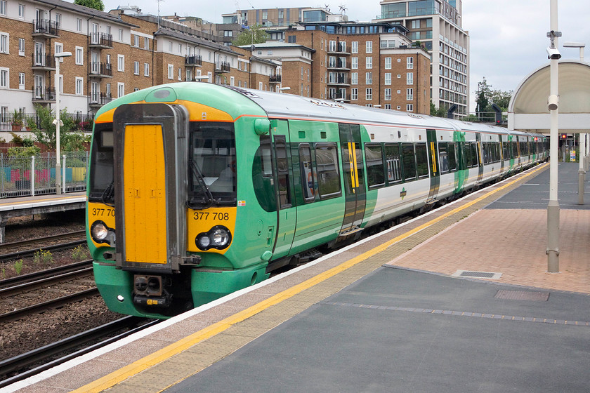 377708, SN 14.05 Clapham Junction-Watford Junction (2M41), Kensington Olympia station 
 Our first train home was this Southern service, the 14.05 Clapham Junction to Watford Junction. We took this train, formed by 377708, from here at Kensington Olympia to Watford Junction. We would normally go direct to Milton Keynes, but on Sundays these services only go as far as Watford. 
 Keywords: 377708 14.05 Clapham Junction-Watford Junction 2M41 Kensington Olympia station