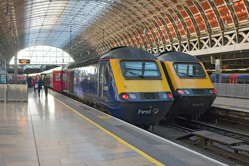 43028, GW 08.45 Penzance-London Paddington (1A81) & 43172, GW 09.18 Paignton-London Paddington (1A15), London Paddington station 
 43028 has just arrived at London Paddington having worked the 1A81 08.45 from Penzance. This train has terminated at platform ten rather than the more usual one or two due to both of these being closed because of electrification works being undertaken. Next to 43028 is 43172 that terminated earlier with the 09.18 from Paignton. Having been one of 253014's power cars it has now been beating a path up and down from Paddington to all destinations in the West Country for an amazing forty years. 
 Keywords: 43028 08.45 Penzance-London Paddington 1A81 43172 09.18 Paignton-London Paddington 1A15 London Paddington station