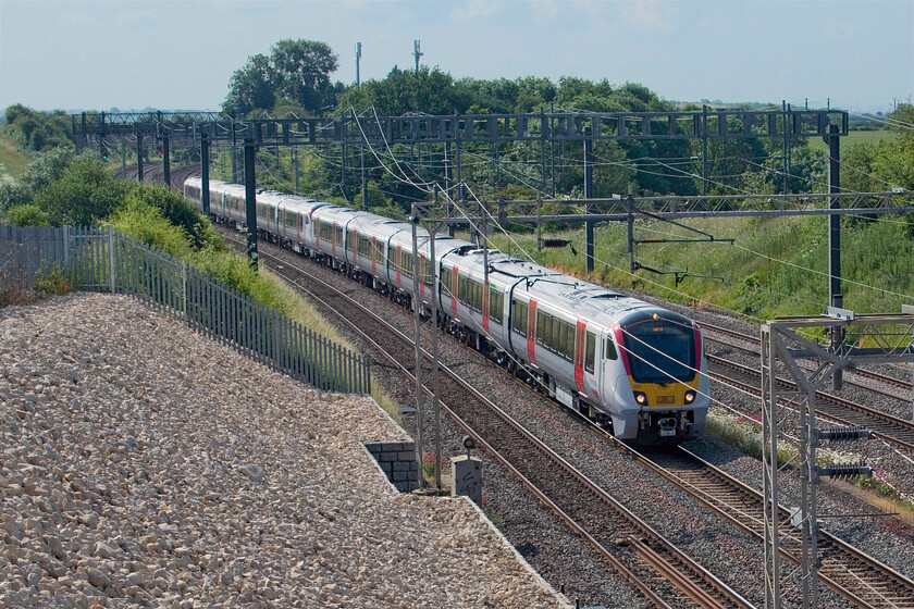 720133 & 720132, 08.45 Wembley Yard-Rugby signal RN4184 (5Q27, 7L), Ashton Road bridge 
 The testing of the Greater Angla Aventra Class 720s continues apace on the southern part of the WCML with regular outings from Wembley returning later in the day. 720133 and 720132 are seen approaching Roade from Ashton Road bridge as the 5Q27 08.45 Wembley Yard to Rugby. 
 Keywords: 720133 720132 08.45 Wembley Yard-Rugby signal RN4184 5Q27 Ashton Road bridge Aventra