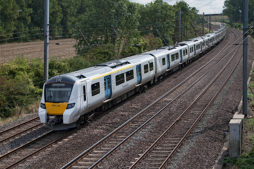 700118, TL 11.33 Gatwick Airport-Bedford (9R28, 1E), Sundon TL035269 
 Thameslink 700118 takes the down slow between Leagrave and Harlington stations on the MML. The new class 700 is working the 11.33 Gatwick Airport to Bedford, a journey it has taken via London Bridge and St. Pancras. The picture is taken from a footbridge over the line that carries the Chiltern Way over the railway. 
 Keywords: 700118 9R28 Sundon TL035269