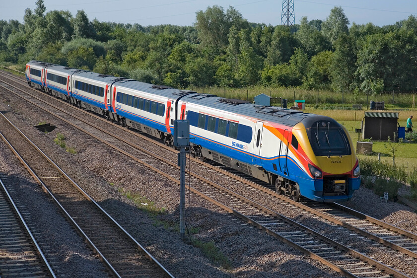 222023, EM 08.00 London St. Pancras-Corby (1M11), Lower Farm Road, Bromham TL028518 
 The 1M11 08.00 St. Pancras to Corby EMT passes Bromham north of Bedford worked by 222023.As part of the stop/start electrification of the MML the up and down slow lines, to the left in this image, will be extended all the way to Glendon Junction north of Kettering. At present the two lines become one bi-directional line a few miles north of this spot at Sharnbrook. Junction creating a severe bottleneck on the route 
 Keywords: 222023 08.00 London St. Pancras-Corby 1M11 Lower Farm Road Bromham TL028518 East Midlands Trains EMT