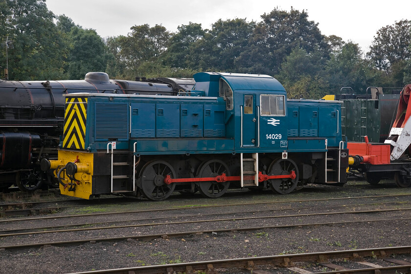 14029, stabled, Wansford Yard 
 Resident Class 14 'Teddy Bear' is seen stabled in the yard at Wansford. Carrying its BR TOPS number of 14029 was one of nineteen of the original fifty-six produced with all being built at Swindon. They were designed for use on the Western Region for workings that were largely redundant by the time that they entered service! Many ended up moving to Hull Dairycoates for use on their huge docks network. They did not last long there being largely incapable of the work without being double-headed, something that required double-manning. 
 Keywords: 14029, stabled, Wansford Yard Teddy Bear