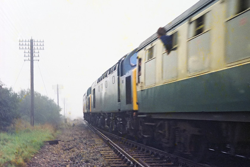 40081 & 40083, outward leg of the Deltic to Devon Cromptons to Cornwall, London Paddington Par (1Z30), Fairwood Junction 
 A near identical shot to that taken the previous Sunday but for the weather! At Fairwood Junction just west of Westbury 40081and 40083, take the outward leg of the RPPR's Deltic to Devon/Cromptons to Cornwall railtour back on to the mainline. The 40s led the train from London Paddington to Newton Abbot and then 33017 and 33022 took the train on to Par and back. So, that was it, 2 Sundays and 2 double-headed class 40s on railtours past Fairwood Junction.....who would have ever thought that would have happened?