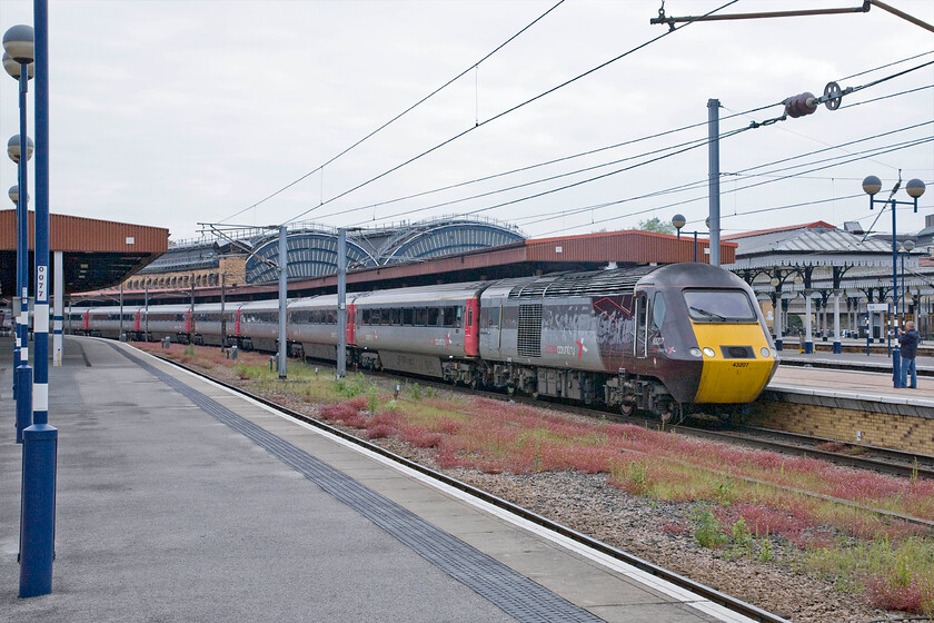 43207, XC 06.06 Edinburgh Waverley-Plymouth (1V50), York station 
 The livery applied by CrossCountry to their small HST fleet looks smart and I am sure that they offer a far more pleasurable travelling experience for passengers than the dreadful Voyagers. 43207 leads the 06.06 Edinburgh to Plymouth 1V50 service away from York. 
 Keywords: 43207 06.06 Edinburgh Waverley-Plymouth 1V50 York station CrossCountry HST