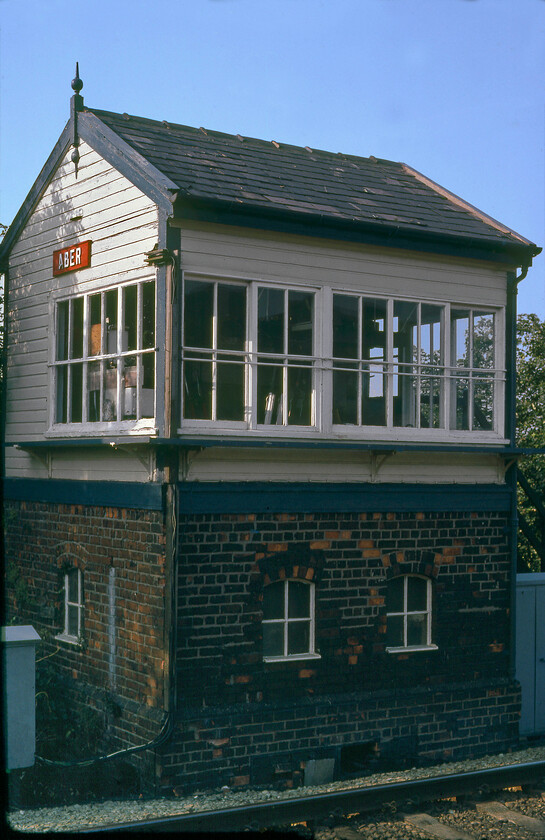 Aber signal box (LNW, date not known) 
 Aber (short for Abergwyngregyn) was an isolated signal box providing the only intermediate block post between Bangor and Penmaenmawr. During evenings the box was unmanned making it a long block section of some ten miles for such a busy mixed traffic line. The box was located very close to where Aber station was situated. This station was somewhat isolated from the settlements it professed to serve and closed in 1960. The box was a super early example of an L&NWR structure but I have no details of its date of construction unless anybody can help. 
 Keywords: Aber signal box L&NWR