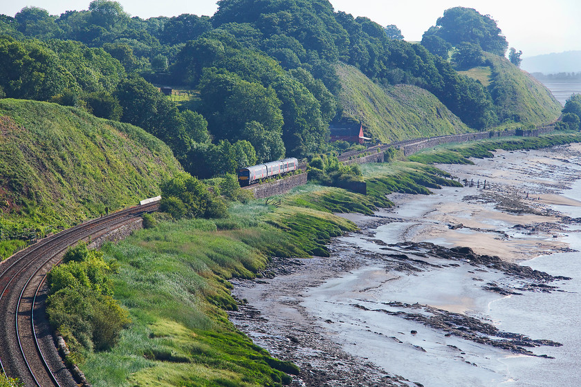 170109, XC 05.58 Nottingham-Cardiff Central (1V03, 3E), Purton SO672049 
 170109 runs along the side of the Severn Estuary forming the 05.58 Nottingham to Cardiff Central 1V03 service. This is a little known but stunning section of line that is rarely photographed. Notice the red house in the middle distance. This house was for sale at the time of writing complete with a covered balcony overlooking the railway and the River Severn......perfect, but the wife wouldn't have it! 
 Keywords: 170109 1V03 Purton SO672049