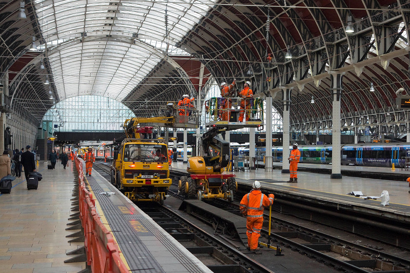 Electrification work being undertaken, London Paddington station 
 Engineering work to install the catenary is underway on Paddington's platforms one and two. Whilst I am not a fan of electrification, for a number of reasons, the method if installation under the grade 1 listed Paddington train shed has been undertaken carefully to mitigate any visual impact. 
 Keywords: Electrification work being undertaken London Paddington station